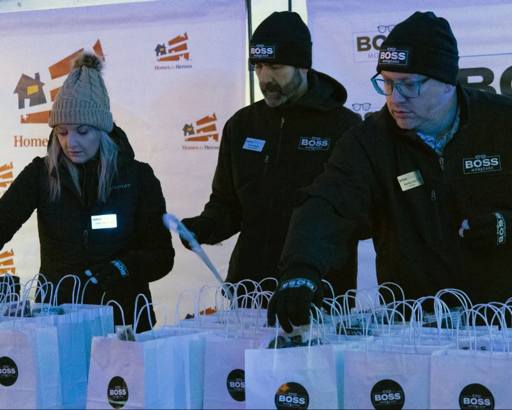 Boss Mortgage staff volunteering at a winter community event