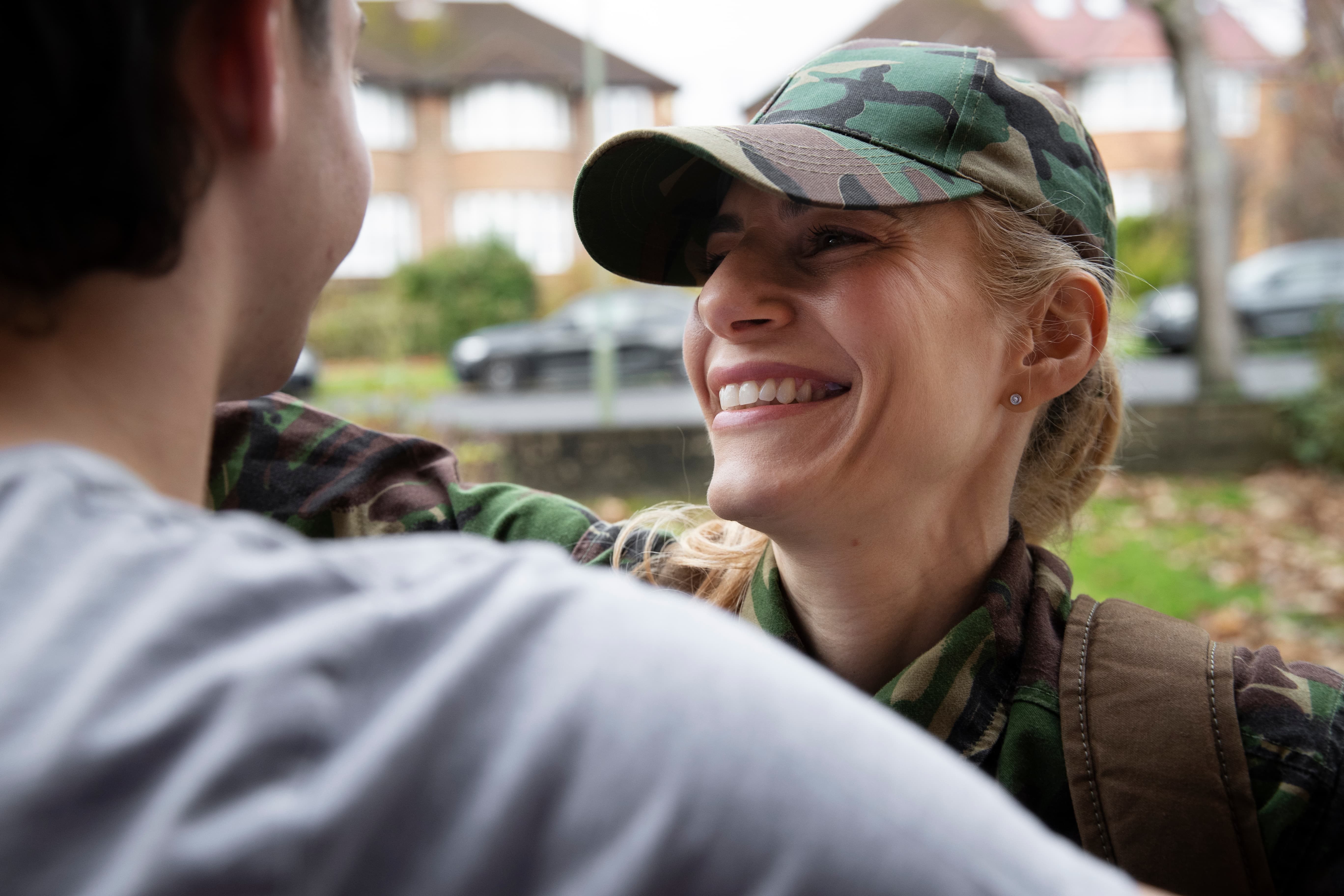 soldier hugging husband
